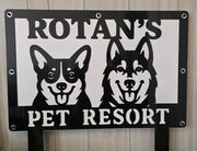Custom Rolan's Pet Resort metal sign with dog silhouettes